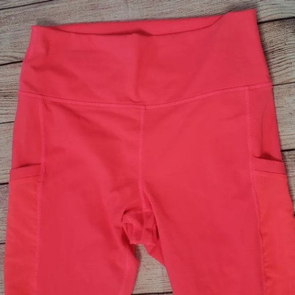 Fabletics On-the-Go High-Waisted Capri in Pop Coral - Picture 5 of 12
